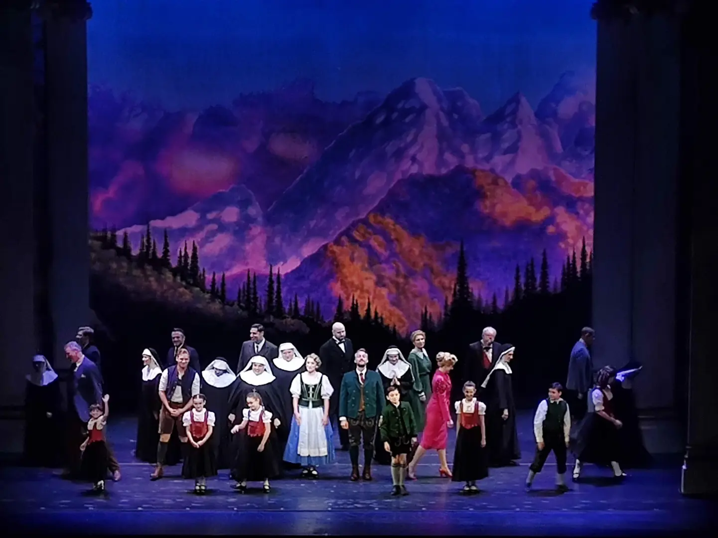 The cast of The Sound of Music bowing on stage