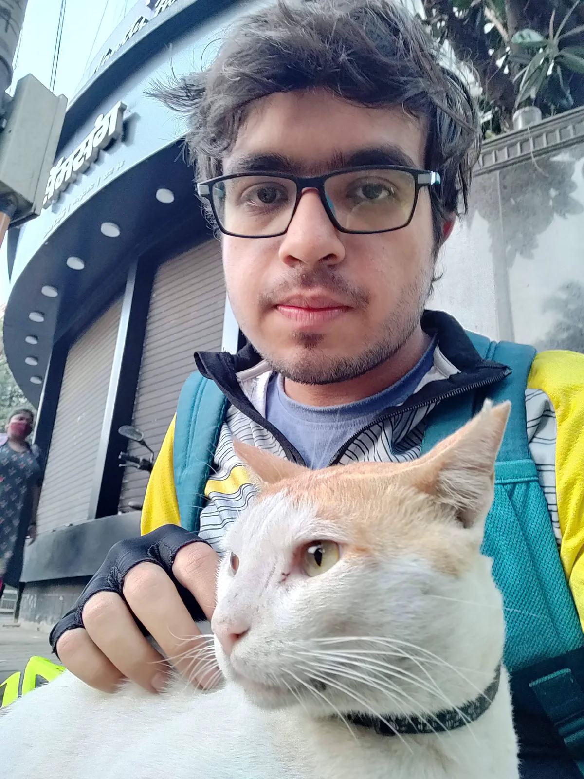 Selfie of Pranshu with cat
