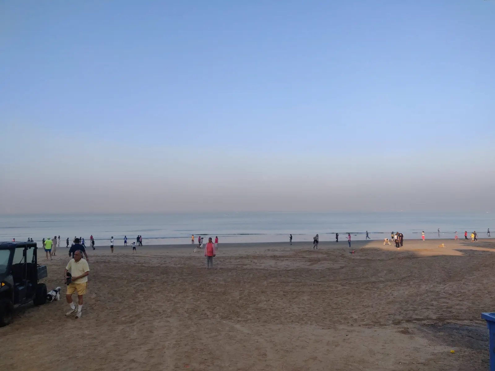 People walking on Juhu beach