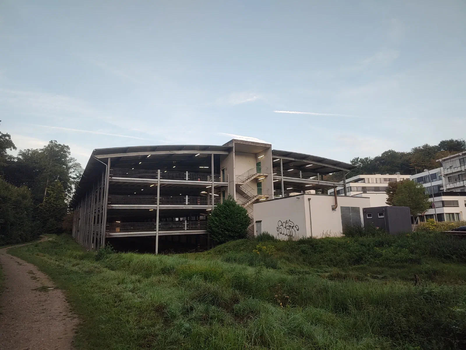A giant metallic structure that is a parking lot.