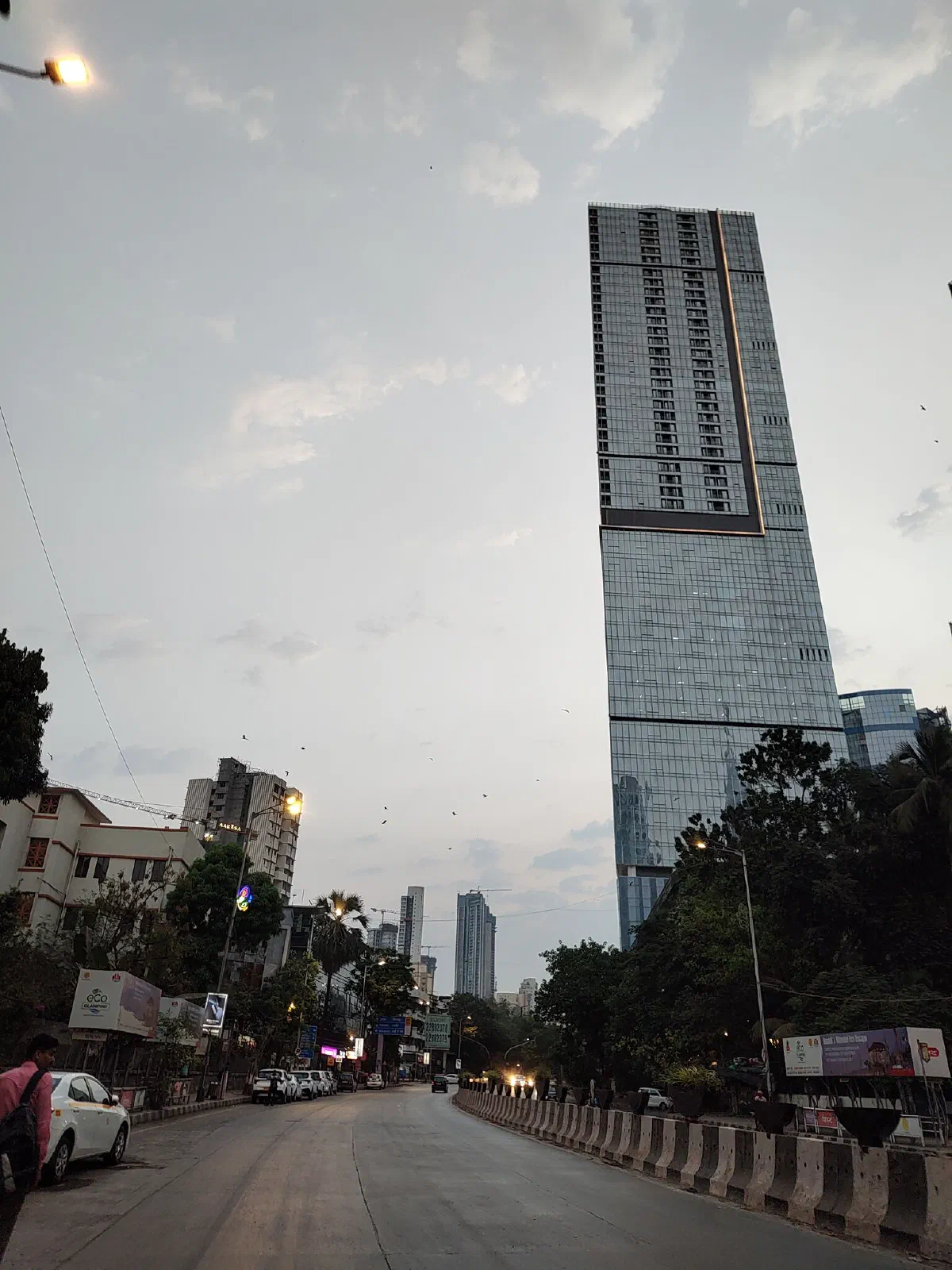 A tall glass skyscraper. 
