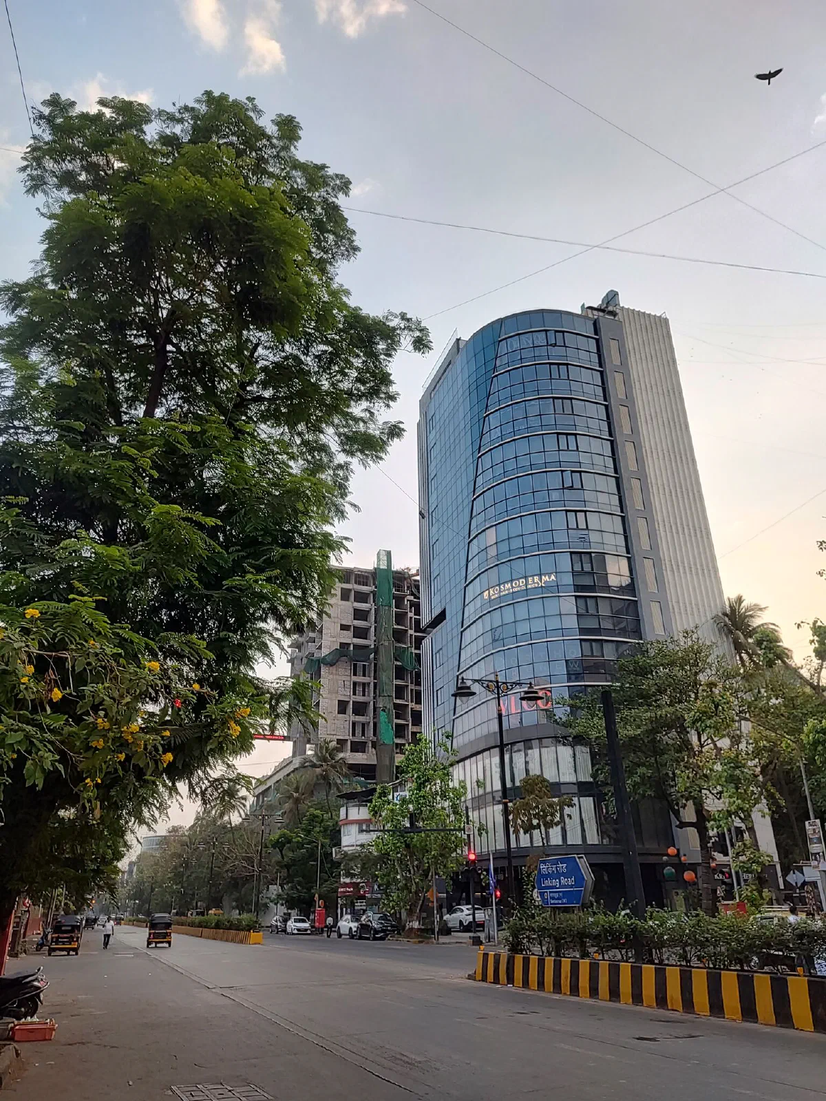 A not-as-tall glass skyscraper. 
